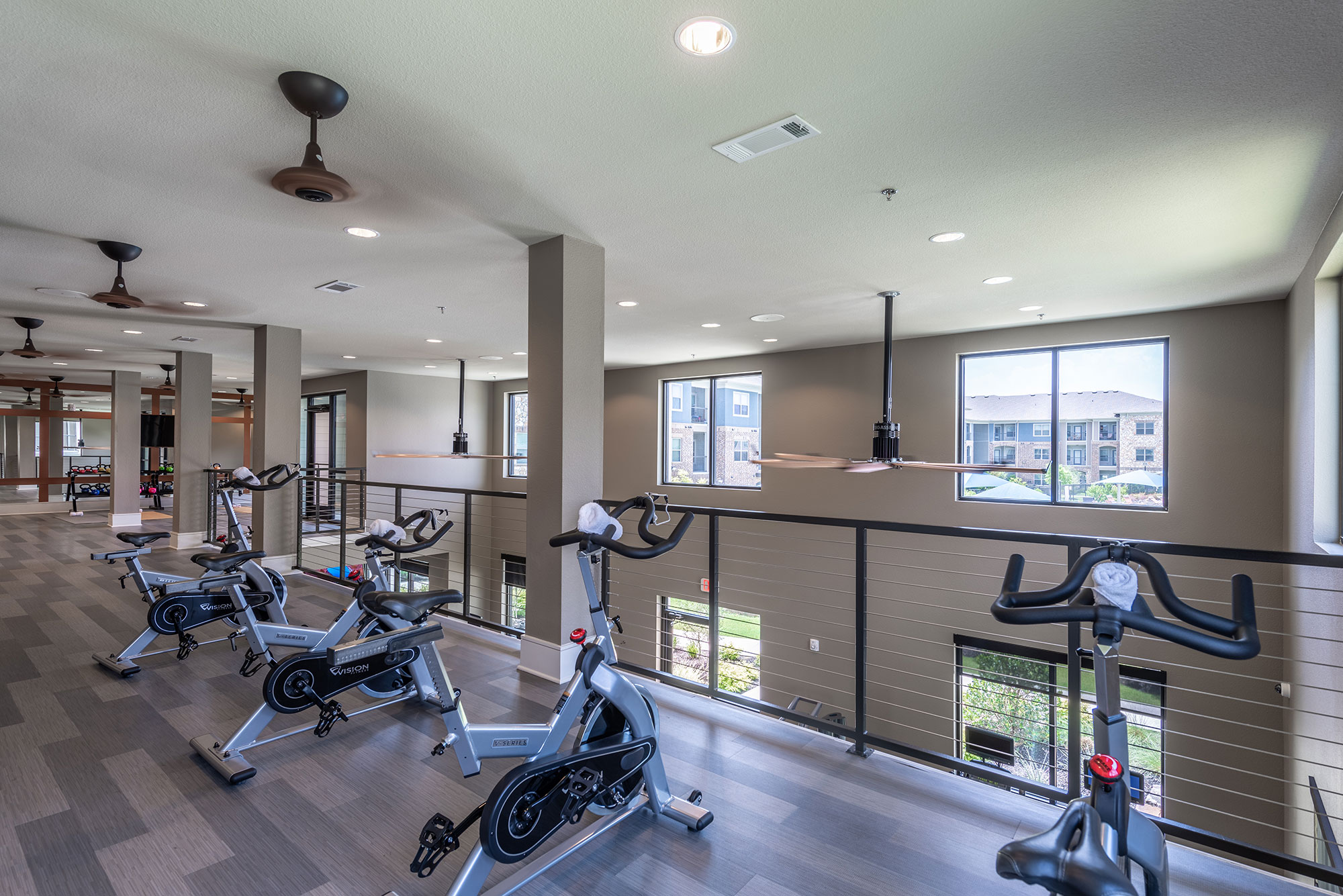 fitness center with second story cardio space