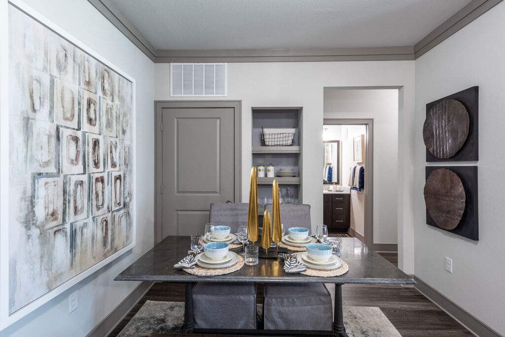 square dining room table and entrance to the hallway