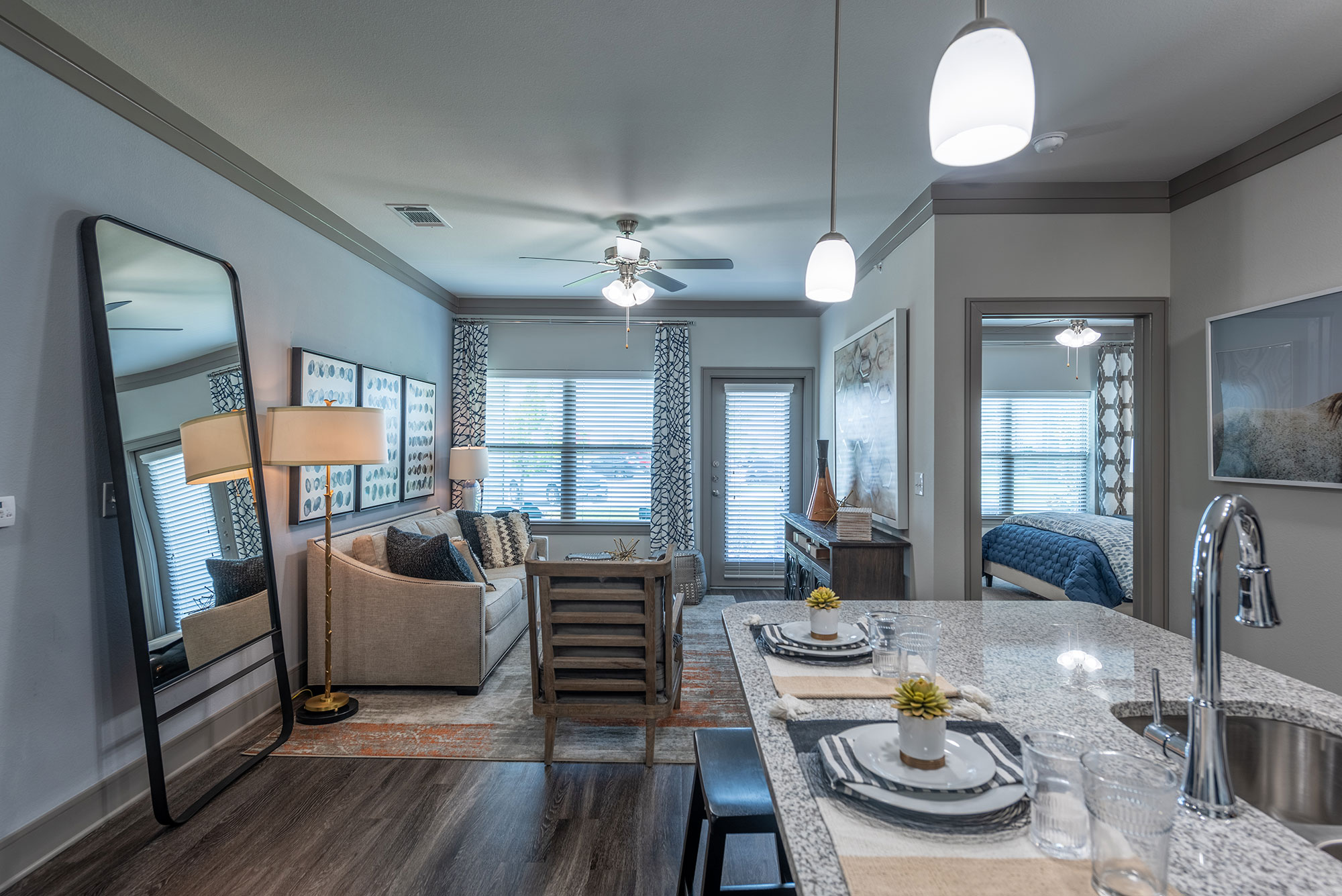 Open living room with large window and patio door