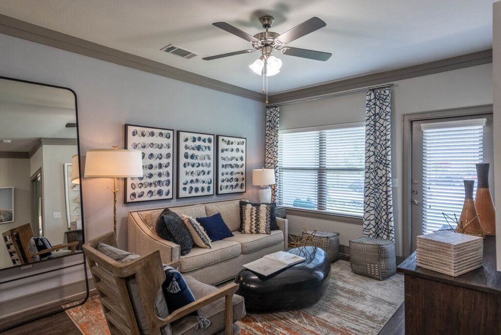 Living Room with couch and 2 panel window and door to patio